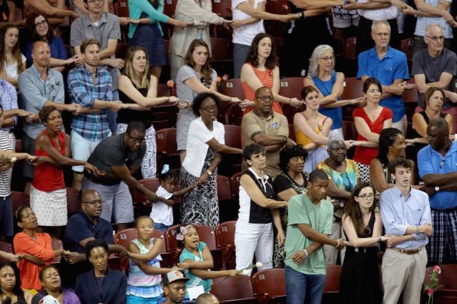 people connected by fairh holding hands